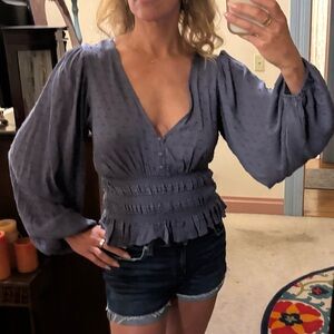 Smocked Peplum Blouse with Long Sleeves